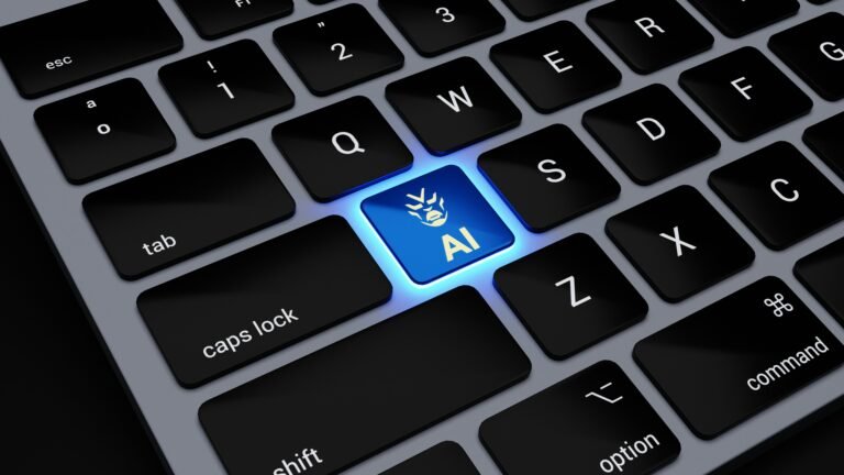 A dark laptop keyboard with a glowing blue AI key representing automated task completion for our AgentOn review
