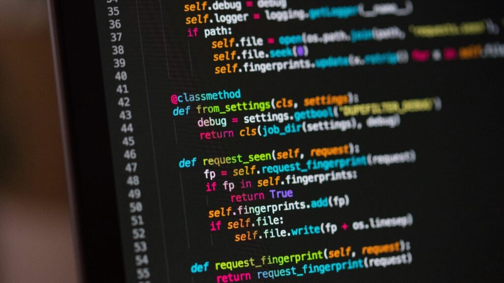 Developer writing code for custom iOS app development services