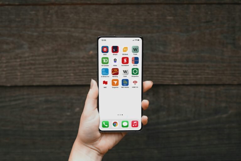 Smartphone displaying app monetization graphics and digital revenue charts