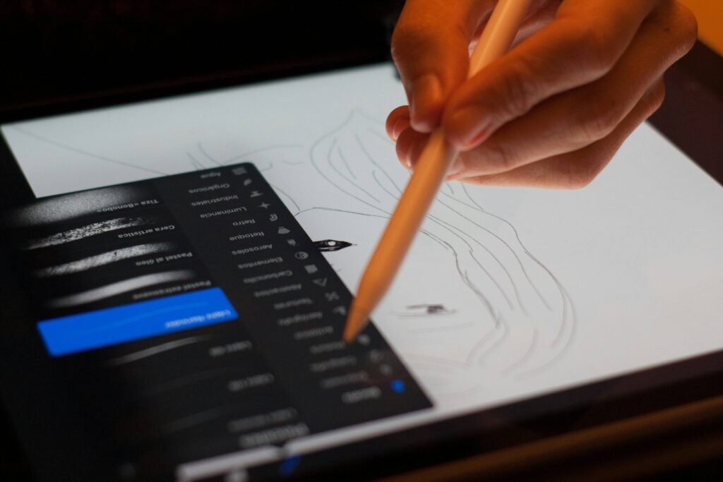 Digital artist using a tablet for character design art prompts.