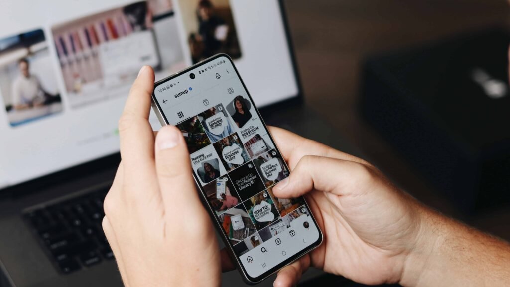 Social media content creation on smartphone displaying ways to make money online