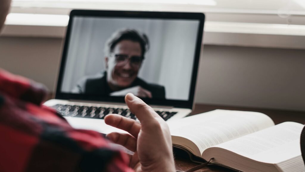 Online tutoring video call on laptop displaying legit ways to make money online