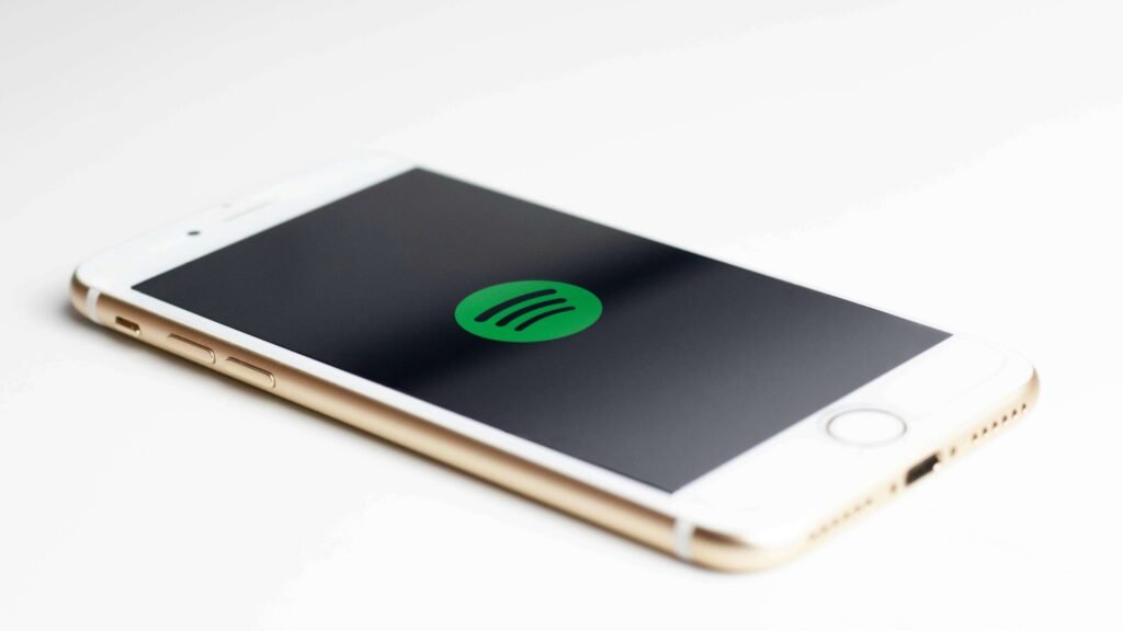 Spotify app logo on mobile screen representing options for best audiobook apps