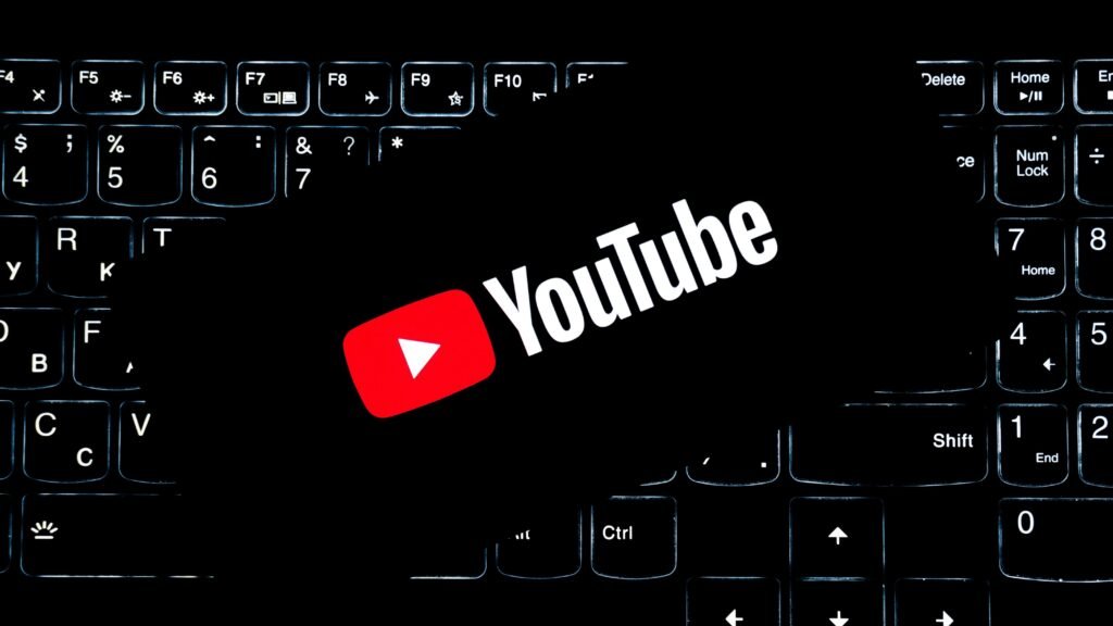 YouTube content creation setup on laptop keyboard illustrating ways to make money online
